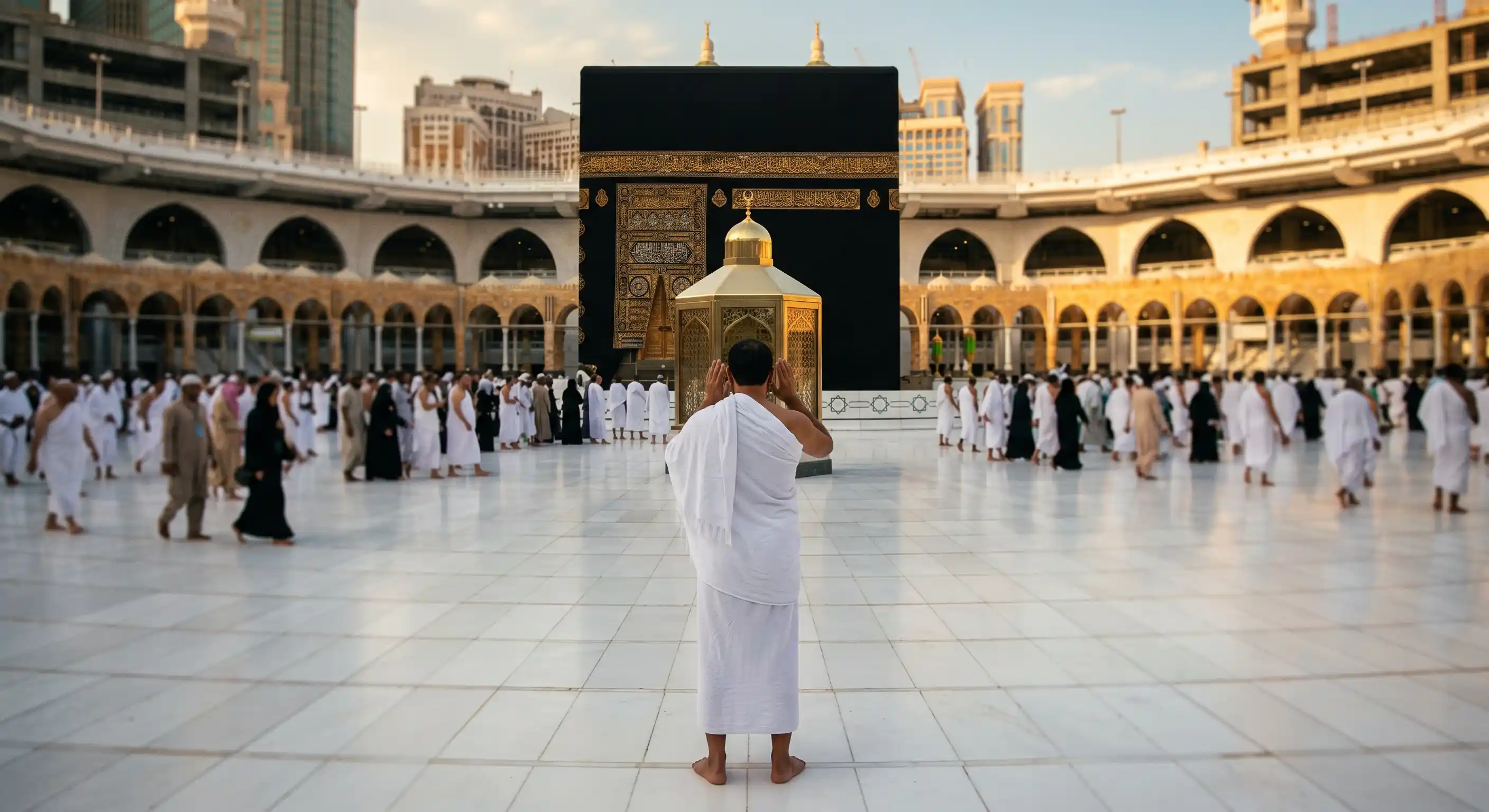 Pilgrim praying two rakat behind Maqam Ibrahim after completing tawaf