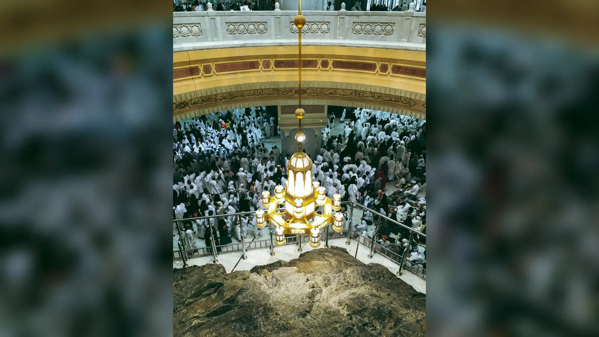 Pilgrims performing sa’i, walking between the hills of Safa and Marwah